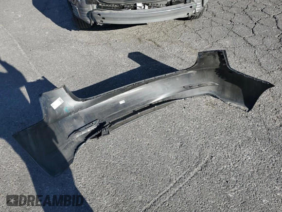 2023 Tesla Model 3 with VIN 5YJ3E1EA4PF556782, listed as a Copart auction lot 55626935 with 26,615 mi miles and Salvage title. Bid and sale history available at DreamBid. Image 12.