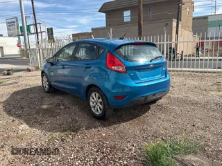 2013 Ford Fiesta SE with VIN 3FADP4EJ0DM141097, listed as a Copart auction lot 51342175 with 146,316 mi miles and Clean Title. Bid and sale history available at carsss.com. Image 3.