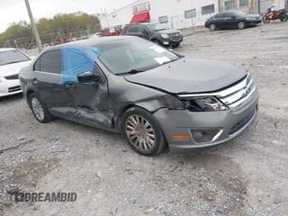 2010 Ford Fusion Hybrid with VIN 3FADP0L31AR326917, listed as a IAAI auction lot 41938486 with 132,845 mi miles and . Bid and sale history available at DreamBid. Image 1.