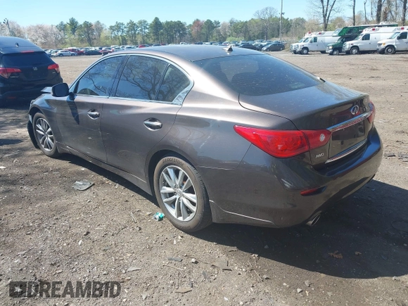 2014 Infiniti Q50 Premium with VIN JN1BV7ARXEM684719, listed as a IAAI auction lot 42122949 with 126,656 mi miles and . Bid and sale history available at DreamBid. Image 3.