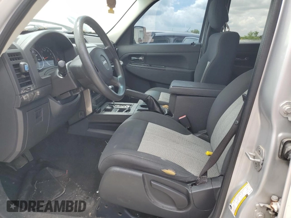 2010 Jeep Liberty Sport with VIN 1J4PN2GK2AW144063, listed as a Copart auction lot 58055585 with 132,580 mi miles and Salvage title. Bid and sale history available at DreamBid. Image 7.