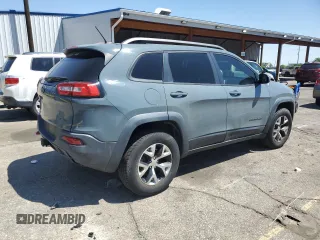 2014 Jeep Cherokee Trailhawk z VIN 1C4PJMBBXEW134939, wystawiony jako Copart lot #56579125 z przebiegiem 155 693 mil mil oraz Czysty tytuł • Clean title. Historia ofert i sprzedaży dostępna na DreamBid. Obrazek 3.