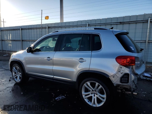 2012 Volkswagen Tiguan LE z VIN WVGAV7AX6CW594438, wystawiony jako Copart lot #42971665 z przebiegiem 120 532 mil mil oraz Szkoda całkowita • Salvage title. Historia ofert i sprzedaży dostępna na DreamBid. Obrazek 2.