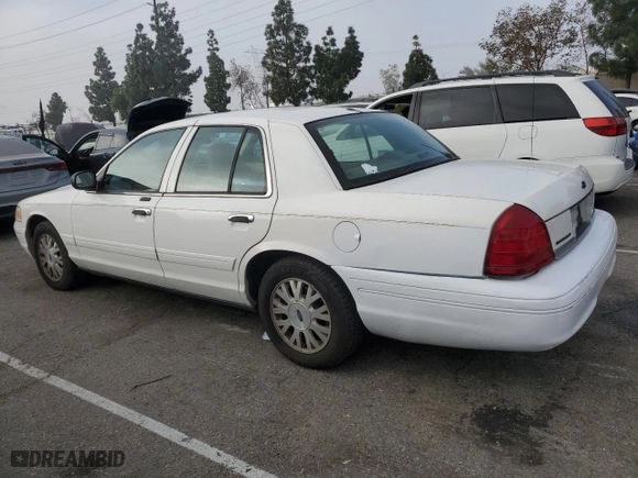 2005 Ford Crown Victoria LX with VIN 2FAFP74W95X124697, listed as a Copart auction lot 86931404 with 303,132 mi miles and Clean Title. Bid and sale history available at carsss.com. Image 2.