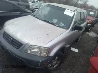 1997 Honda CR-V with VIN JHLRD1841VC002597, listed as a IAAI auction lot 36104231 with 297,037 mi miles. Bid and sale history available at carsss.com. Image 2.