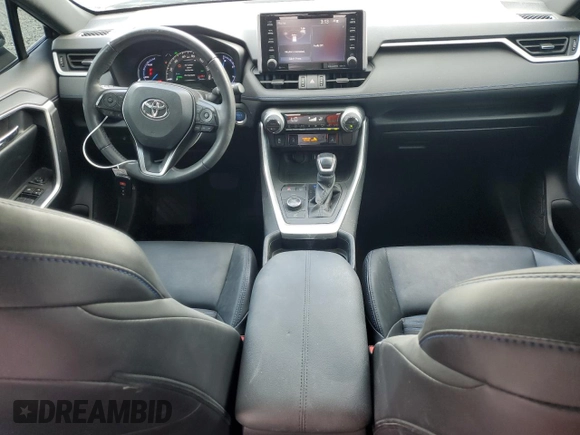 2021 Toyota RAV4 Hybrid XSE with VIN 2T3E6RFVXMW020561, listed as a Copart auction lot 64822005 with 39,434 mi miles and Salvage title. Bid and sale history available at DreamBid. Image 8.