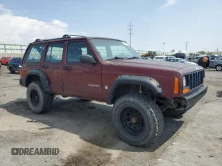 2000 Jeep Cherokee SE with VIN 1J4FF28S9YL133208, listed as a Copart auction lot 63827924 with 0 mi miles and Salvage Title. Bid and sale history available at carsss.com. Image 4.