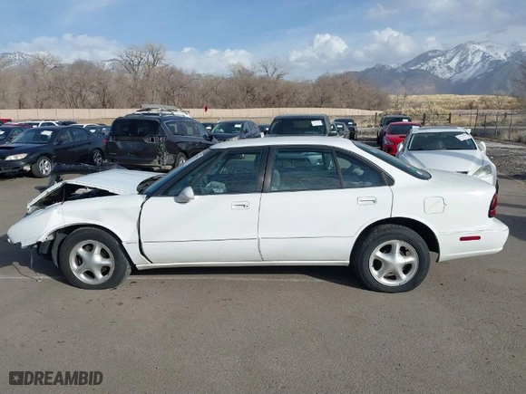 1999 Oldsmobile 88 LS with VIN 1G3HN52K0X4837561, listed as a IAAI auction lot 41414590 with NaN miles. Bid and sale history available at carsss.com. Image 15.