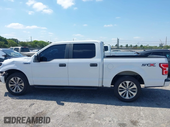 2018 Ford F-150 XL with VIN 1FTEW1CP8JKE91006, listed as a IAAI auction lot 42123840 with 76,806 mi miles and . Bid and sale history available at DreamBid. Image 15.