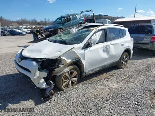 2017 Toyota RAV4 XLE with VIN JTMRFREV7HJ716723, listed as a IAAI auction lot 41672427 with 1 mi miles. Bid and sale history available at carsss.com. Image 2.
