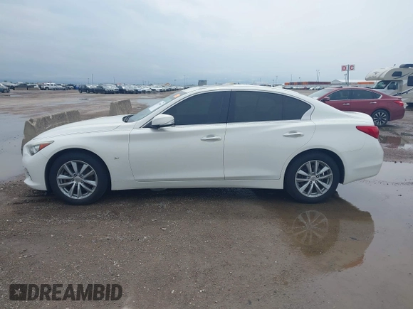 2015 Infiniti Q50 Premium z VIN JN1BV7AR6FM402481, wystawiony jako IAAI lot #41957004 z przebiegiem 171 913 mil mil oraz . Historia ofert i sprzedaży dostępna na DreamBid. Obrazek 14.