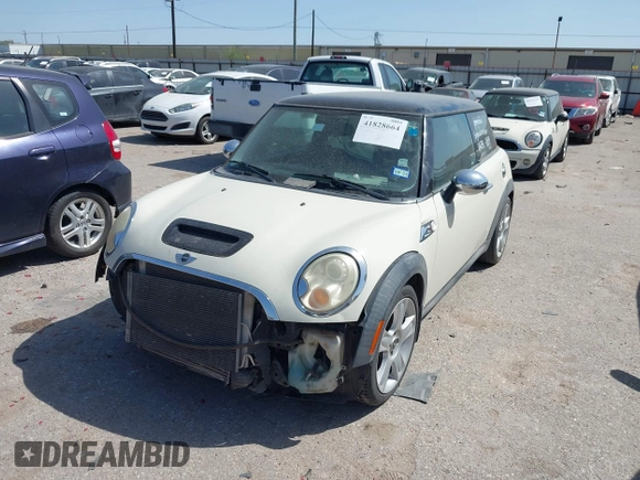 2007 MINI Hardtop S with VIN WMWMF73527TT82098, listed as a IAAI auction lot 41828664 with 107,418 mi miles and . Bid and sale history available at DreamBid. Image 2.