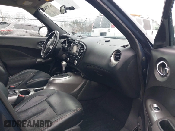 2013 Nissan Juke S with VIN JN8AF5MV7DT209881, listed as a IAAI auction lot 41728623 with 185,296 mi miles and . Bid and sale history available at DreamBid. Image 5.