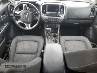 2016 GMC Canyon 4WD SLE z VIN 1GTG6CE38G1303839, wystawiony jako Copart lot #57387295 z przebiegiem 87 945 mil mil oraz Nie do naprawy. Historia ofert i sprzedaży dostępna na DreamBid. Obrazek 8.