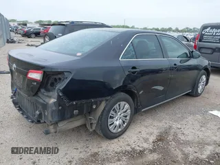 2014 Toyota Camry L with VIN 4T4BF1FK2ER390414, listed as a IAAI auction lot 41936368 with 164,811 mi miles and . Bid and sale history available at DreamBid. Image 4.