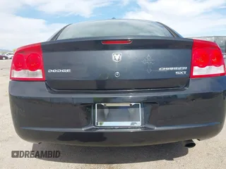 2010 Dodge Charger SXT with VIN 2B3CA3CV4AH153286, listed as a IAAI auction lot 42110970 with 162,424 mi miles and . Bid and sale history available at DreamBid. Image 16.
