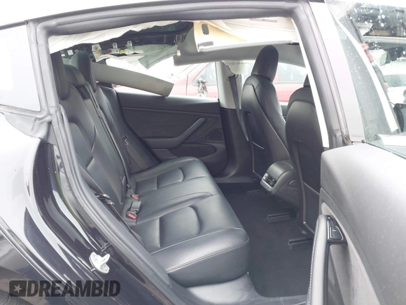 2018 Tesla Model 3 Long Range Battery with VIN 5YJ3E1EB3JF090567, listed as a IAAI auction lot 41568312 with 35,327 mi miles and . Bid and sale history available at DreamBid. Image 8.
