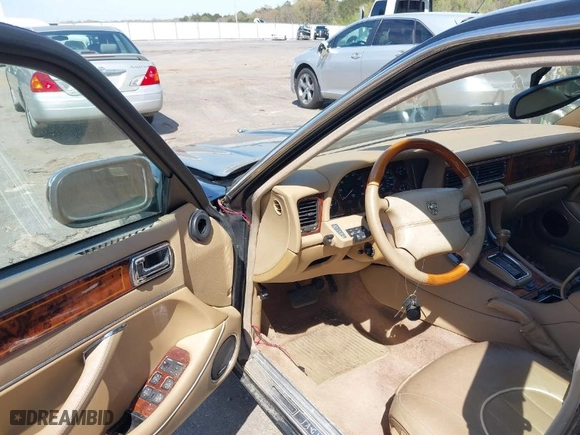 1996 Jaguar XJ Series Sedan Vanden Plas with VIN SAJKX6245TC780444, listed as a IAAI auction lot 41856403 with 1 mi miles. Bid and sale history available at carsss.com. Image 5.