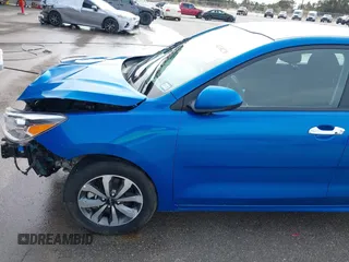 2023 Kia Rio S with VIN 3KPA25AD4PE558982, listed as a IAAI auction lot 41338270 with 40,965 mi miles and . Bid and sale history available at DreamBid. Image 18.