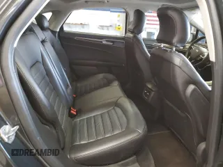 2015 Ford Fusion SE z VIN 3FA6P0H98FR295646, wystawiony jako Copart lot #57055105 z przebiegiem 121 515 mil mil oraz Szkoda całkowita • Salvage title. Historia ofert i sprzedaży dostępna na DreamBid. Obrazek 10.