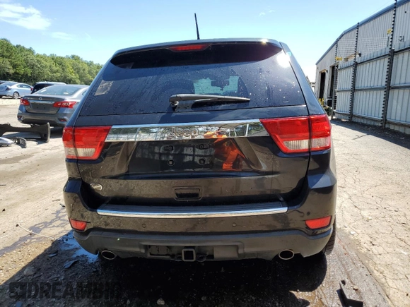 2012 Jeep Grand Cherokee Overland with VIN 1C4RJECTXCC227769, listed as a Copart auction lot 68760174 with 144,537 mi miles and Salvage Title. Bid and sale history available at carsss.com. Image 6.