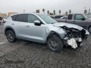 2017 Mazda CX-5 Touring with VIN JM3KFACL9H0183937, listed as a Copart auction lot 48861865 with 91,268 mi miles and Salvage Title. Bid and sale history available at carsss.com. Image 4.