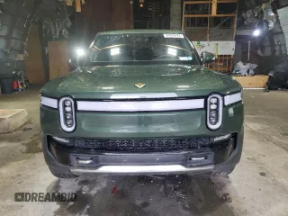 2023 Rivian R1T Adventure with VIN 7FCTGAAA0PN024165, listed as a Copart auction lot 84265444 with Not Provided miles and Salvage Title. Bid and sale history available at carsss.com. Image 5.