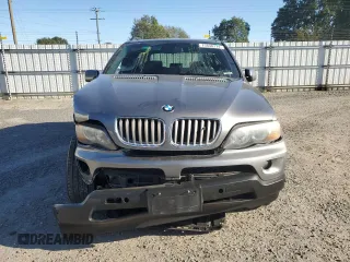 2005 BMW X5 4.4i with VIN 5UXFB53565LV15453, listed as a Copart auction lot 75830774 with 148,211 mi miles and Salvage Title. Bid and sale history available at carsss.com. Image 5.