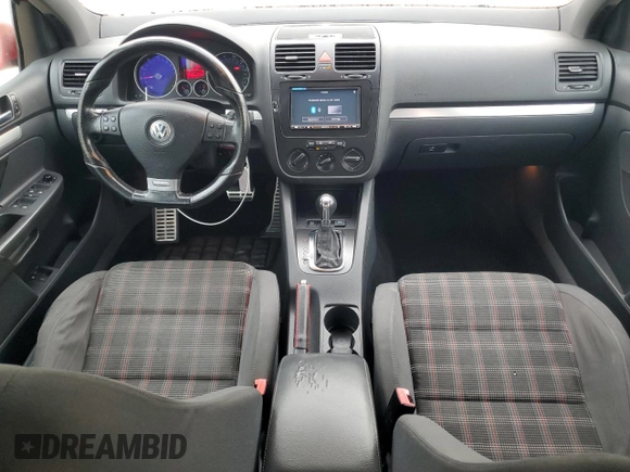 2009 Volkswagen Golf GTI z VIN WVWHV71K89W118353, wystawiony jako Copart lot #63072245 z przebiegiem 124 546 mil mil oraz Szkoda całkowita • Salvage title. Historia ofert i sprzedaży dostępna na DreamBid. Obrazek 8.