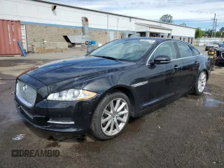 2012 Jaguar XJ with VIN SAJWA1CB5CLV22363, listed as a Copart auction lot 63801315 with 33,775 mi miles and Salvage title. Bid and sale history available at DreamBid. Image 1.