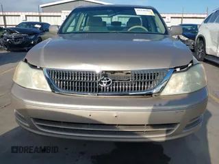 2001 Toyota Avalon XL z VIN 4T1BF28B31U185174, wystawiony jako IAAI lot #42338204 z przebiegiem 298 540 mil mil oraz . Historia ofert i sprzedaży dostępna na DreamBid. Obrazek 6.