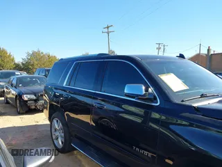 2020 Chevrolet Tahoe LTZ with VIN 1GNSCCKCXLR106732, listed as a IAAI auction lot 41486660 with Not provided miles and . Bid and sale history available at DreamBid. Image 14.