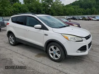 2013 Ford Escape SE with VIN 1FMCU9G9XDUA92061, listed as a Copart auction lot 63074655 with 150,848 mi miles and Salvage title. Bid and sale history available at DreamBid. Image 4.