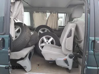 2002 Volkswagen EuroVan MV с VIN WV2NB47092H095600, выставлен на аукционе Copart как лот 50705065 с пробегом 223 049 миль миль и Чистый • Clean title. История ставок и продаж доступна на DreamBid. Изображение 11.