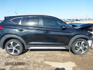 2017 Hyundai Tucson Sport z VIN KM8J33A23HU490270, wystawiony jako IAAI lot #42042967 z przebiegiem 121 660 mil mil oraz . Historia ofert i sprzedaży dostępna na DreamBid. Obrazek 13.