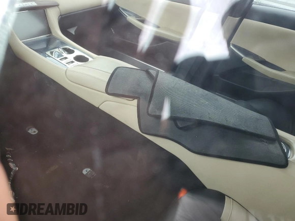 2012 Fisker Karma EcoSport с VIN YH4K14AA0CA001402, выставлен на аукционе Copart как лот 82791574 с пробегом Не указан миль и Списание • Salvage title. История ставок и продаж доступна на DreamBid. Изображение 8.