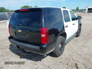 2012 Chevrolet Tahoe Commercial with VIN 1GNLC2E05CR320494, listed as a IAAI auction lot 42838775 with 120,139 mi miles and . Bid and sale history available at DreamBid. Image 4.