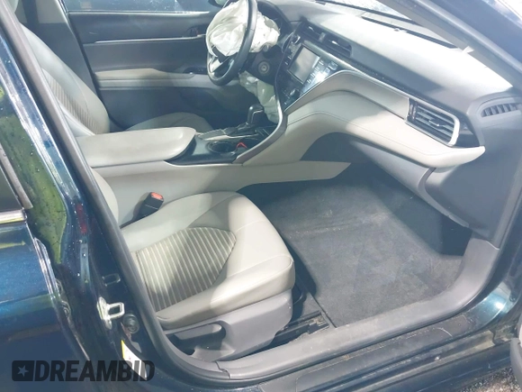 2018 Toyota Camry LE z VIN 4T1B11HK8JU517019, wystawiony jako IAAI lot #42220646 z przebiegiem 98 924 mil mil oraz . Historia ofert i sprzedaży dostępna na DreamBid. Obrazek 5.