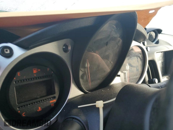 2014 Nissan 370Z Touring with VIN JN1AZ4FH8EM621259, listed as a Copart auction lot 77571454 with Not Provided miles and Salvage Title. Bid and sale history available at DreamBid. Image 9.