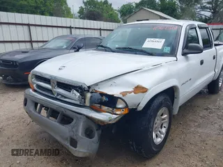2000 Dodge Dakota Sport with VIN 1B7GL2AN4YS691223, listed as a IAAI auction lot 41964561 with 169,936 mi miles. Bid and sale history available at carsss.com. Image 6.