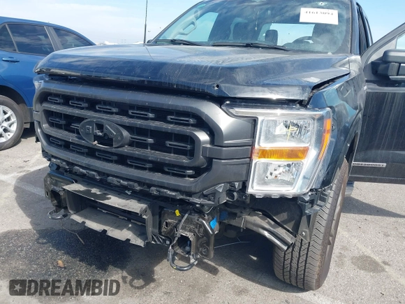 2023 Ford F-150 XL with VIN 1FTFW1ED8PFD08597, listed as a IAAI auction lot 41613094 with 7,266 mi miles and . Bid and sale history available at carsss.com. Image 6.