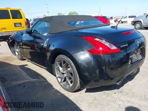 2014 Nissan 370Z Touring with VIN JN1AZ4FH8EM620208, listed as a IAAI auction lot 42094292 with 68,799 mi miles and . Bid and sale history available at DreamBid. Image 3.