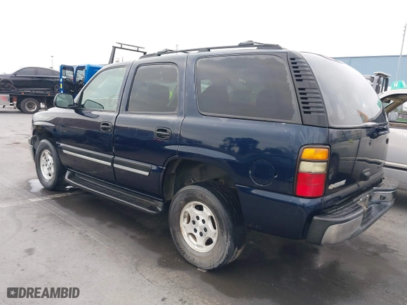 2004 Chevrolet Tahoe LS with VIN 1GNEC13T64J195165, listed as a IAAI auction lot 41446654 with 351,992 mi miles. Bid and sale history available at carsss.com. Image 3.