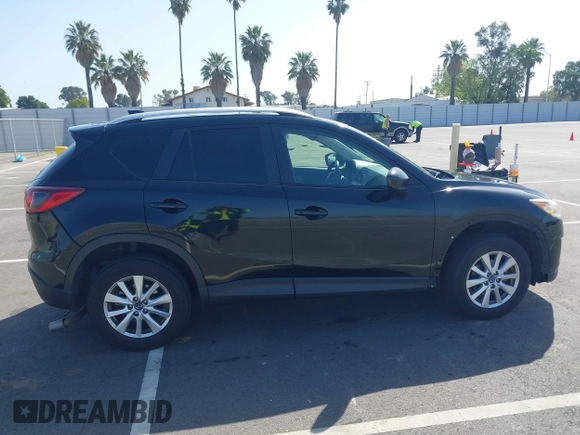 2014 Mazda CX-5 Sport z VIN JM3KE2BE8E0371775, wystawiony jako IAAI lot #42111417 z przebiegiem 150 932 mil mil oraz . Historia ofert i sprzedaży dostępna na DreamBid. Obrazek 13.