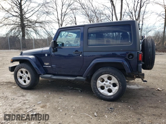 2013 Jeep Wrangler Sahara with VIN 1C4AJWBG3DL516842, listed as a Copart auction lot 49246065 with 129,594 mi miles and Salvage title. Bid and sale history available at DreamBid. Image 2.