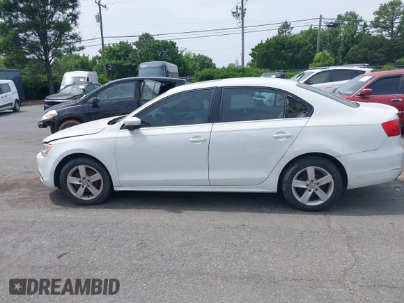 2014 Volkswagen Jetta TDI w/Premium/Nav with VIN 3VWLL7AJ4EM430524, listed as a IAAI auction lot 42268673 with 137,721 mi miles and . Bid and sale history available at DreamBid. Image 13.