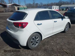 2022 Kia Rio S with VIN 3KPA25AD5NE458130, listed as a IAAI auction lot 41530395 with 33,154 mi miles and . Bid and sale history available at DreamBid. Image 4.