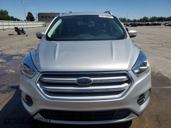 2019 Ford Escape Titanium с VIN 1FMCU9J90KUB85595, выставлен на аукционе Copart как лот 57410045 с пробегом 47 995 миль миль и Списание • Salvage title. История ставок и продаж доступна на DreamBid. Изображение 5.