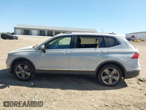 2018 Volkswagen Tiguan SEL Premium with VIN 3VV5B7AX5JM004713, listed as a IAAI auction lot 40498843 with 92,256 mi miles and . Bid and sale history available at DreamBid. Image 14.