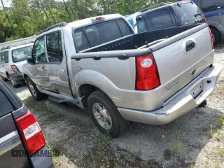 2004 Ford Explorer Sport Trac XLS with VIN 1FMZU67K24UB65144, listed as a Copart auction lot 52611305 with 211,806 mi miles and Salvage title. Bid and sale history available at DreamBid. Image 2.